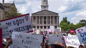 Activists march near the Tennessee State Capital building in Nashville, Tennessee, May 14,2022 as part of a nation wide protest for reproductive rights after a leak from the Supreme Court that suggest Roe v Wade will be overturned. (Seth Herald/AFP via Getty Images)