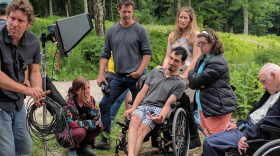 Campers at Zeno Mountain Farms spend a month living in wheelchair-accessible tree houses, performing, making films and taking care of one another. (Jon Kalish/For VPR)