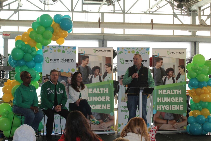 Governor Mike Kehoe speaks as Dr. Grenita Lathan, Doug Pitt and Krystal Simon look on at Shop with a Hero hosted by Care to Learn on February 7, 2026 in Springfield, Mo.
