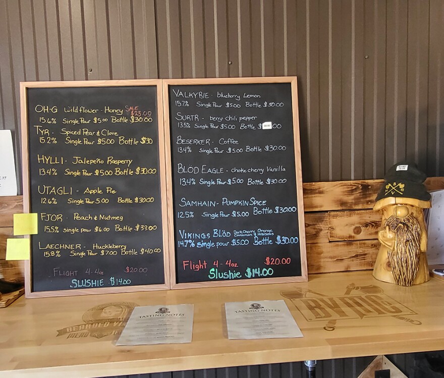A menu board in the tasting room at the Bearded Viking Mead Company lists the meads available for tasting and bottles for sale to take to the fire pit for enjoyment.