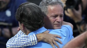  Rays owner Stuart Sternberg, right, hugs president Brian Auld after the team's video tribute to his 22 years as principle owner during a game at Tampa's Steinbrenner Field on Saturday, Sept. 20, 2025. 