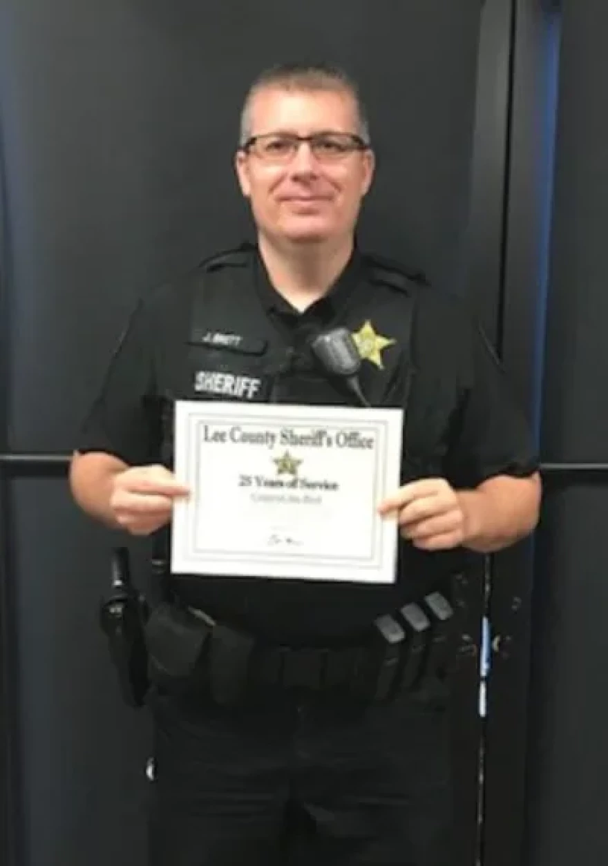 Lee County Sheriff’s Cpl. Jay Brett, shown here accepting an LCSO lifetime achievement award for 25 years service in 2020.