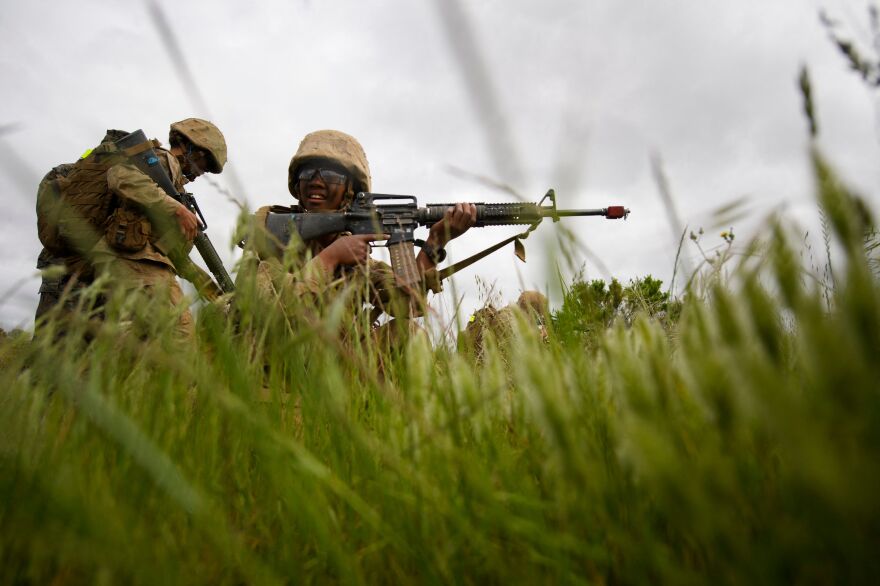 United States Marine Corps recruits from Lima Company take part in training on April 21, 2021, before officially becoming U.S. Marines. Lima Company is the first gender integrated company with a female platoon training alongside male platoons.