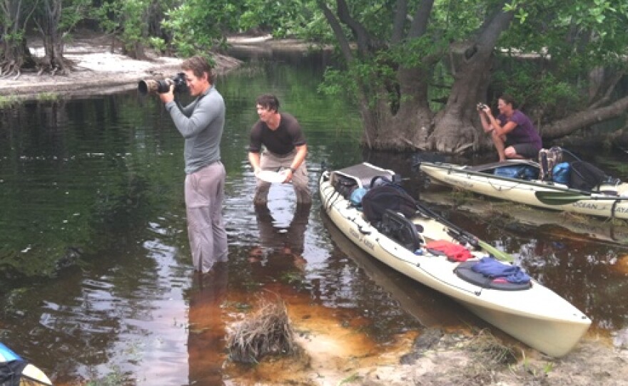 Expedition members Carlton Ward, left, Joe Guthrie and Mallory Lykes Dimmitt on the Suwannee River in Georgia's Okefenokee Swamp. (Click on picture to view other images)