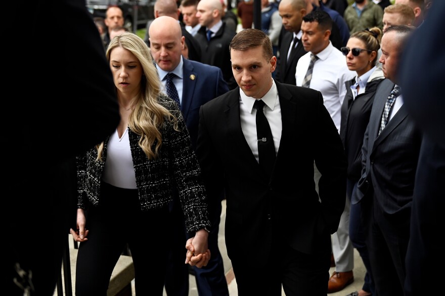 State Trooper Brian North arrives for his arraignment in Milford Superior Court in Milford, Connecticut May 3, 2022. North fatally shot 19-year-old Mubarak Soulemane in January 2020 after a high-speed chase and has been charged with manslaughter.