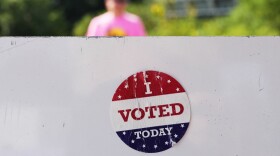 An " I Voted Today" sticker on an information sign at Olbrich Gardens Tuesday, Aug. 11, 2026, in Madison, Wis.