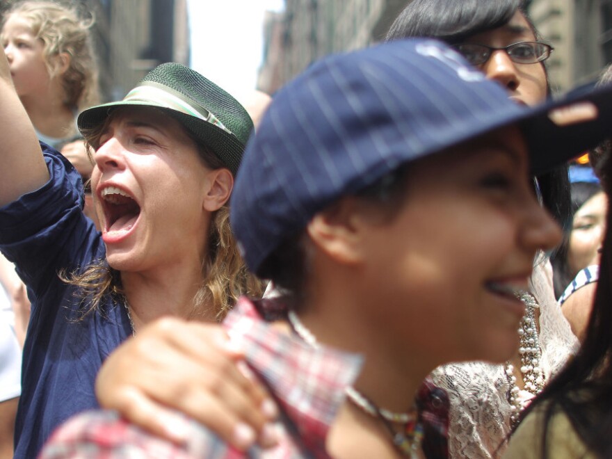 Revelers celebrate during New York City's Gay Pride Parade, two days after the state Legislature legalized same-sex marriage.