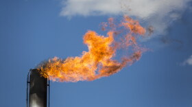 Gas is burned off from an oil well in West Texas.