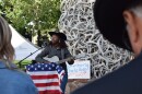 Bea Jones plays for a small crowd on Jackson’s Town Square hours after the news broke that Charlie Kirk had been fatally shot. Jones, a conservative, organized the vigil not as a political space but to “grieve, remember, and stand together in unity.”