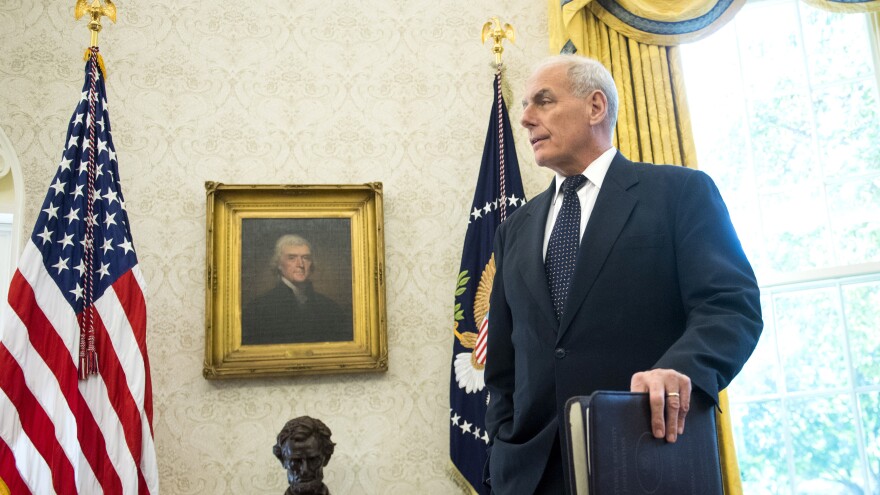 White House Chief of Staff John Kelly listens as President Trump speaks at the White House on Oct. 19.