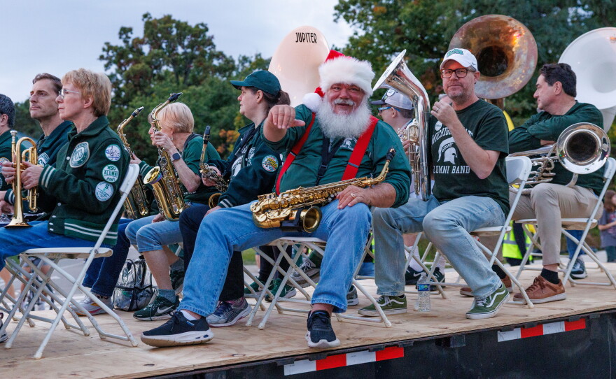 The Michigan State University Alumni Band performs in the Michigan State University Homecoming Parade in East Lansing, Mich., on Oct. 9, 2026.