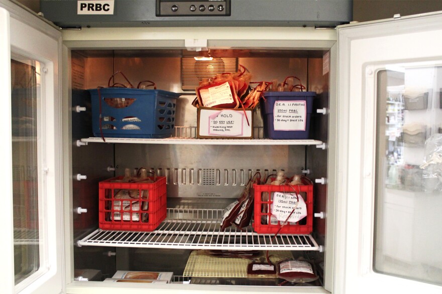 "It's pretty slim pickin's," Blue Ridge Veterinary Blood Bank manager Jocelyn Pratt says of the fridge where she stores packed red blood cells before they are mailed out. More than half of these will be gone by the end of the day, she predicts.