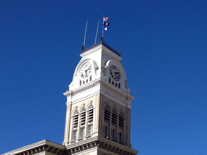 Clock tower against blue sky