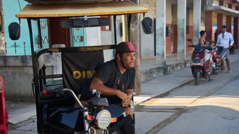 Liexer De La Cruz awaits customers in Campo Florido, Cuba's Havana province, Friday, Sept. 4, 2026.