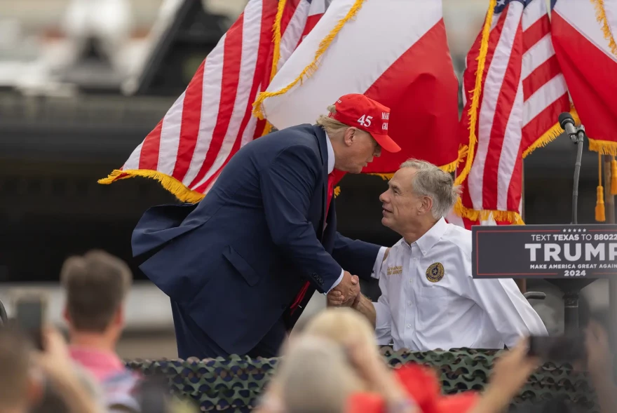 Gov. Greg Abbott, seen with then-President Donald Trump in Edinburg in 2023, was praised by Trump recently for his border security efforts.