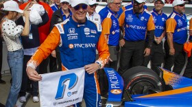 Scott Dixon celebrates winning the pole position for the Indianapolis 500 on Sunday, May 22.