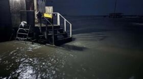 flood waters pool around the outside of a home