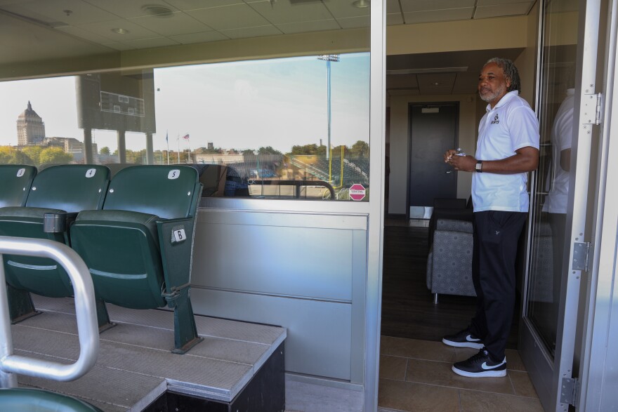 Eric Rose, director of community athletics at the Rochester Sports Community Complex, looks out from one of the recently repaired suites at the stadium. Two of the 14 suites remain closed due to water and related damage, while others have recently undergone repairs.