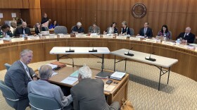 FILE - New Mexico legislative staff prepare to present details of a massive annual spending plan to a panel of state House legislators on Feb. 15, 2023, in Santa Fe, N.M. The New Mexico Senate on Sunday, March 12, 2023, endorsed the nearly $9.6 billion budget to fund public salaries, shore up rural health care networks and expand no-pay day care and college. (AP Photo/Morgan Lee, File)