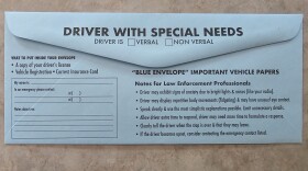 A photo of the envelopes being distributed as part of the Maine State Police's new Blue Envelope Program.