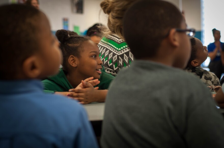 Second-grade students at Koch Elementary School in the Riverview Gardens school district listen to a book reading Thursday.