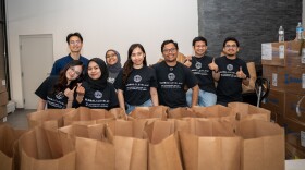The YSEALI folks volunteered for the May Dugan Center food distribtuion program during their last morning in Cleveland.