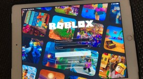The gaming platform Roblox is displayed on a tablet, Oct. 30, 2021, in New York.