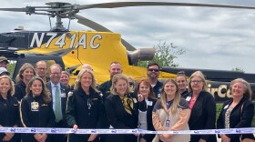 Officials affiliated with University of Iowa Health Care's AirCare medical transport cut the ribbon for a new helipad in Davenport, Thursday, MY 21, 2026.
