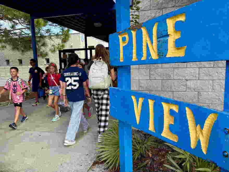 Students walk on the campus of Pine View School, where complaints against a history teacher prompted investigations by Sarasota County Schools and later drew the attention of Florida Attorney General James Uthmeier.