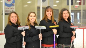 DeeAnn Wlodarski, left, and her curling team. The team plays at the Kansas City Curling Club in Blue Springs, the only dedicated curling facility for more than 350 miles.