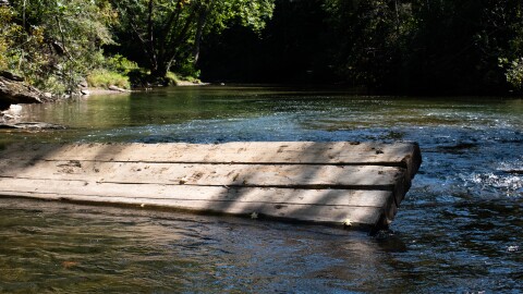 A section of an upstream bridge washed down the New River during Hurricane Helene.