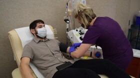 On Monday Menachem Mendel Mangel, a recovered COVID-19 patient, donated plasma at the Community Blood Center.