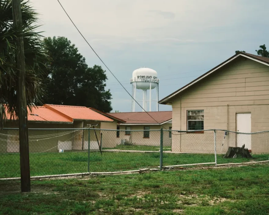 A water tower looms over the small town of Bowling Green, Florida on Tuesday, June 30, 2026. The community would see 98% of its primary residences taken off the tax rolls, if voters approve the proposed property tax rollback on the ballot in November.