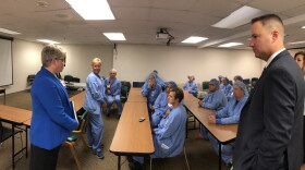 Miami Valley Hospital President, Michael Uhl, and trauma workers gather for lunch in a room that has served as a response headquarters since a mass shooting took the lives of nine people in Dayton's Oregon District, early Sunday morning.   