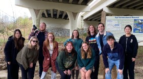 Penn State students studying landscape architecture stand under the Maryland 200 Intercounty Connector to study wildlife crossing and protecting wetland. The ongoing "Rethinking 322" class has been researching road designs across the country to get ideas to improve the State College Area Connector project. 