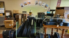 Some of the hundreds of instruments donated to the WoodSongs Tornado Relief Effort are being restored at Currier's Music World in Richmond, Kentucky.