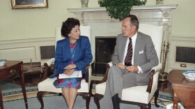 U.S. President George H. Bush meets with Small Business Administration Administrator Pat Saiki, Thursday, Sept. 3, 1992 in the Oval Office of the White House. The meeting was to discuss hurricane relief efforts in Florida and Louisiana.