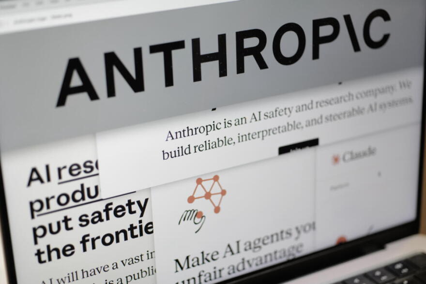 Pages from the Anthropic website and the company's logo are displayed on a computer screen in New York, Feb. 26, 2026. (Patrick Sison/AP)