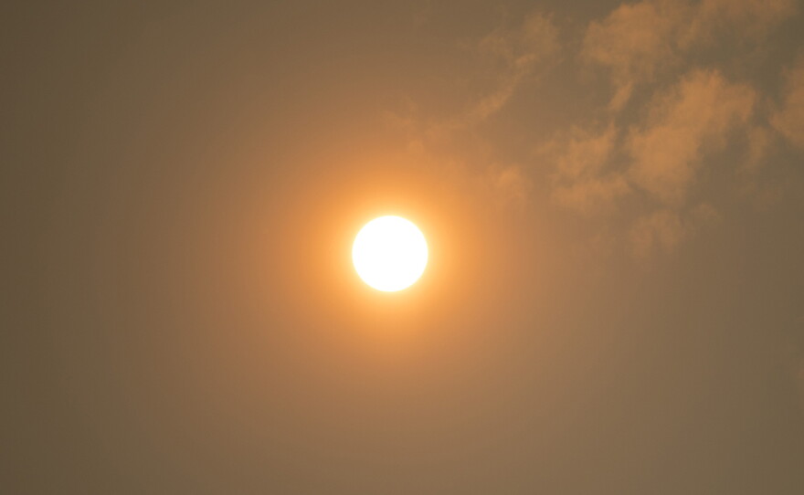 The sun is shown through the smoke from N. Northlake Way on Tuesday, September 5, 2017, in Seattle. 