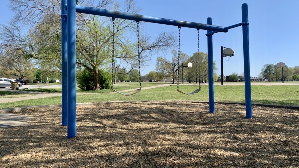 A pair of swings is seen in Johnson Park. Tulsa's parks director says tariffs on steel impact the prices of playground equipment.
