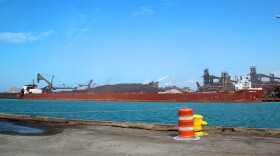 A semi-automated “laker” ship, the Stewart Cort, offloads iron ore at the steel-maker ArcelorMittal across from the Port of Indiana-Burns Harbor.