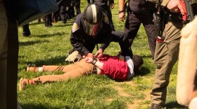 Protesters are continuing to denounce Indiana University administrators’ handling of campus demonstrations, which resulted in violent arrests and bans from campus lasting a year or longer.