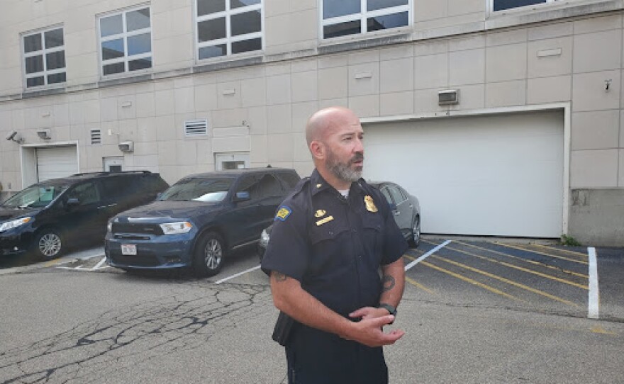 Dayton Police Major Jason Hall speaking to reporters on Tuesday.