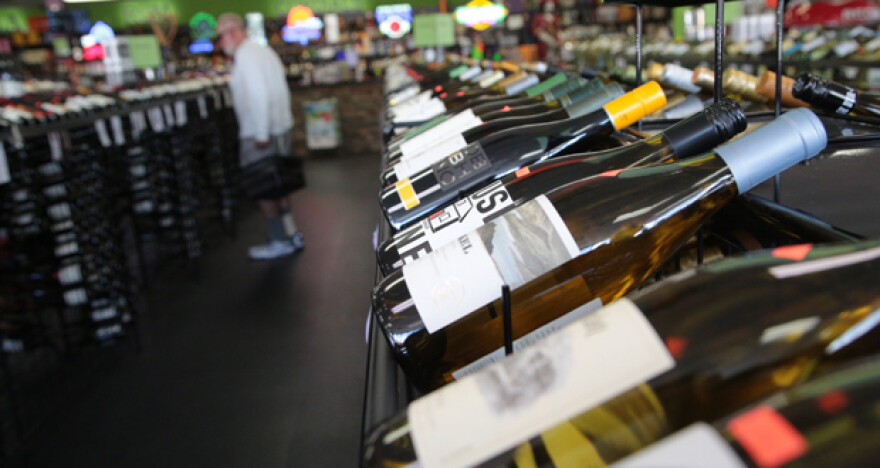 Bottles of wine are displayed on shelves at Market Beverage Co., 204 S. Littler Ave. in Edmond.