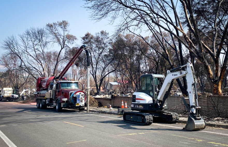 Cleanup crews work on clearing away dangerous debris from Arnos Road in Talent, one of the last roads to remain closed to the public three weeks after the Almeda Fire. 