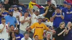Venezuela fans cheer the team during a World Baseball Classic game against the Netherlands, Friday, March 6, 2026, in Miami. 
