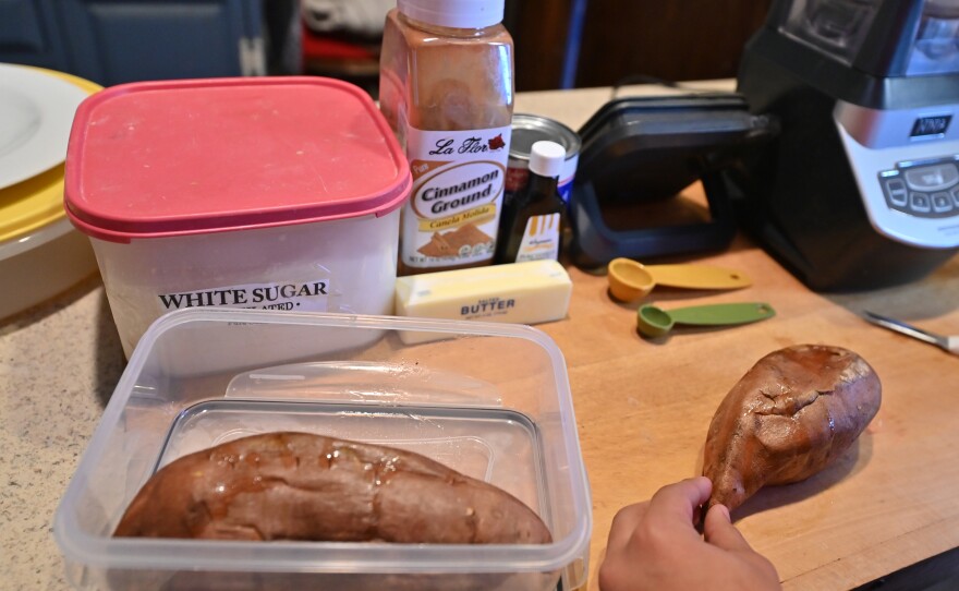 Sweet potatoes are roasted before they are peeled and mashed.