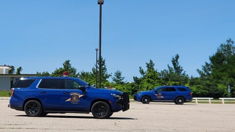 Students through the Northern Michigan Law Enforcement Career Academy practice serpentine exercises in Michigan State Police cars at Alpena Community College on Wednesday, July 22, 2026.