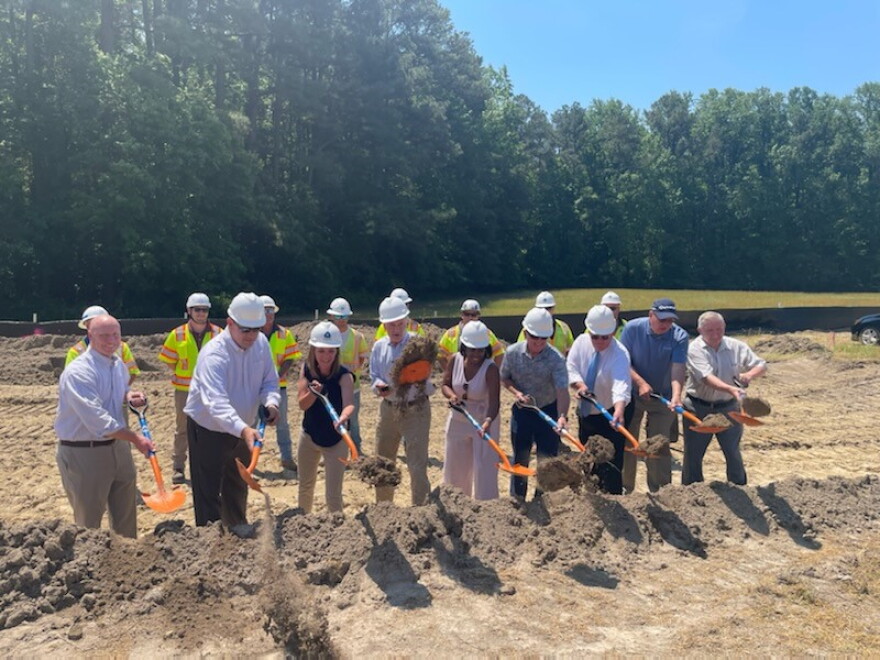 Federal, state and local officials break ground on an infrastructure project near Georgetown.