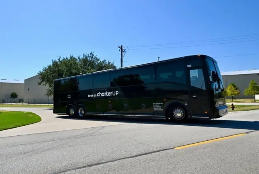 Texas Democrats, who left the state earlier this month in protest of proposed congressional maps, flew in from Illinois Monday morning on Aug. 18, 2025, and sit on a bus headed to the Capitol at the start of the second special session.